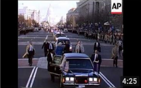 President George H.W. Bush and his wife Barbara walk along Pennsylvania Ave.